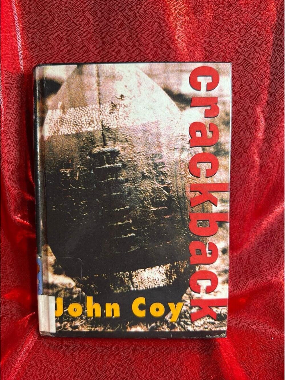 Book young adult novel Crackback by John Coy, which follows a high school footba